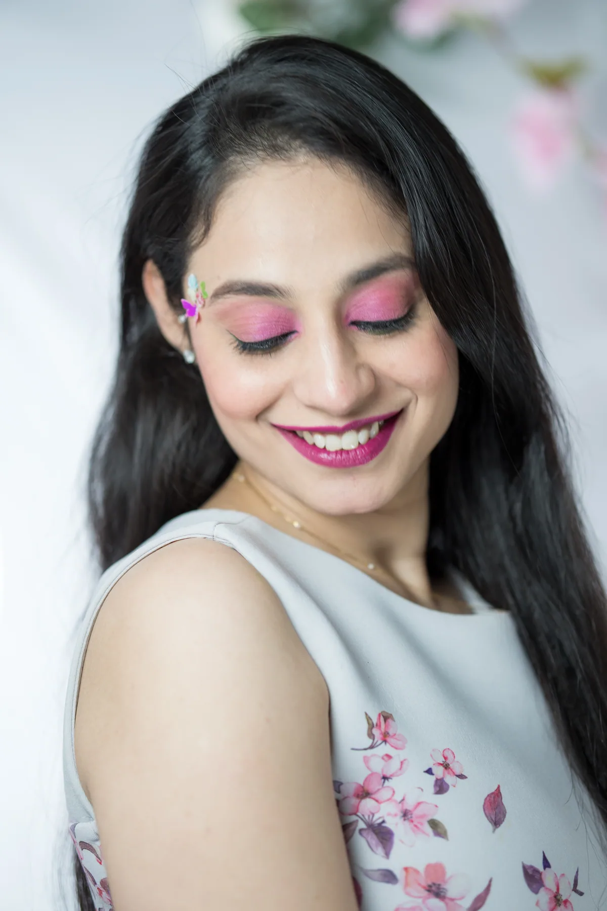 Cherry blossom inspired self makeup look on Gurvani with pink eyeshadow, floral accents, and a soft glam finish