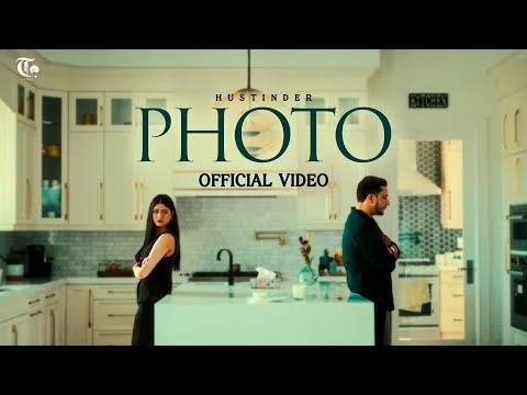 Photo by Hustinder official video cover, with two performers in a kitchen